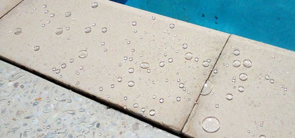 Pool coping and pool pavers require unique sealers that are non-slip and survive corrosive pool chemicals.