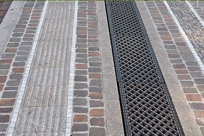 Sealing a pebble stone installation.