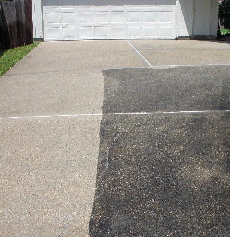 After and Before photo of a concrete driveway. Driveway cleaning usually gets these type of results. Mould remover is applied to improve the outcome. 