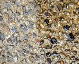 CONCRETE SEALING: Before and after of sealing exposed aggregate.