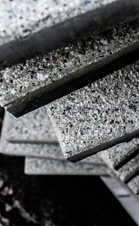 Paving sealer on exposed aggregate paver.