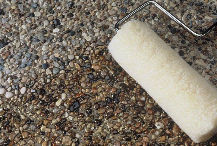 CONCRETE SEALING: Sealing exposed aggregate brings it to life.