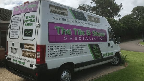 The Tile & Stone Specialists Van is Parked in Front of a House — The Tile & Stone Specialists in Peregian Beach, QLD