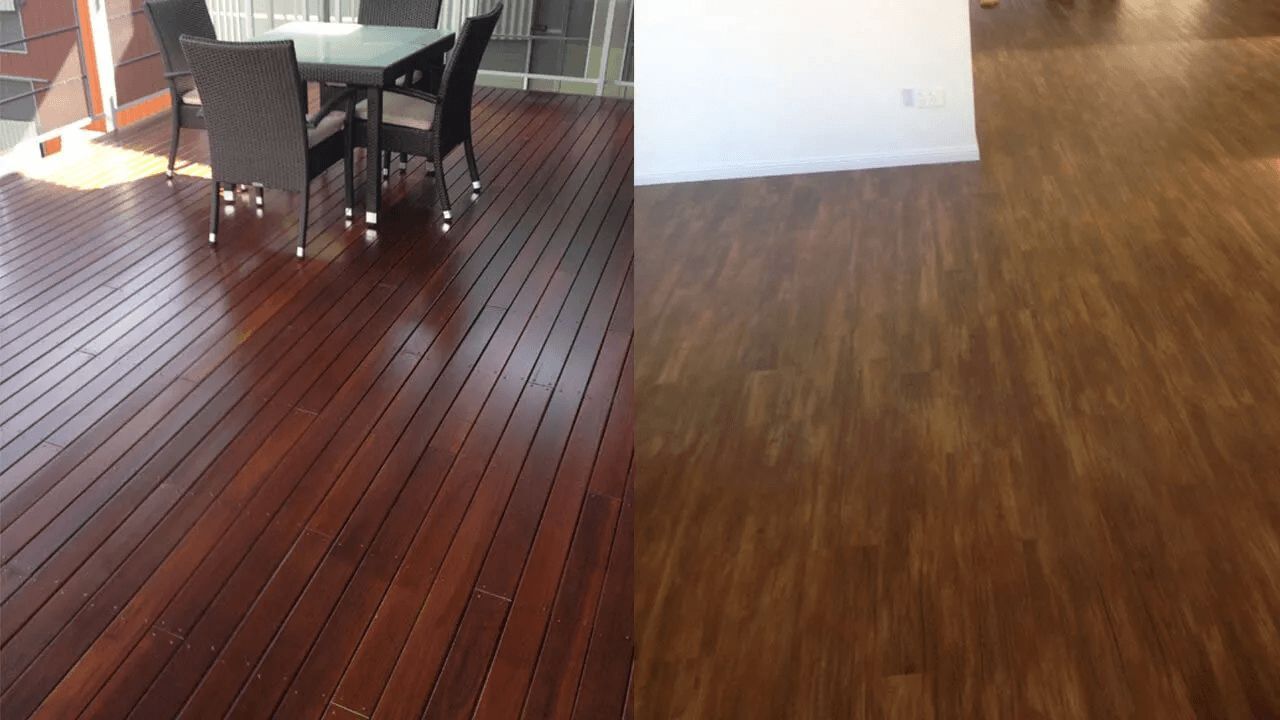 A Wooden Deck With a Table and Chairs on It — The Tile & Stone Specialists in Peregian Beach, QLD