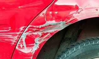 Red car with scratches — Automobile Insurance in Fort Walton Beach, FL