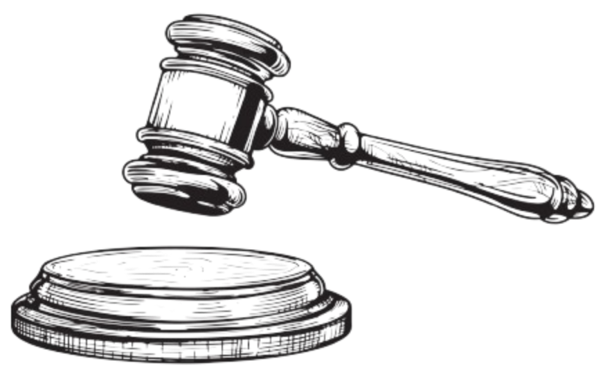 Judge’s gavel resting above a round wooden base
