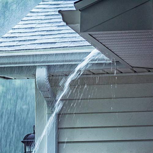 Water Overflowing Roof Gutter — University Place, WA — AAA Rain Gutters