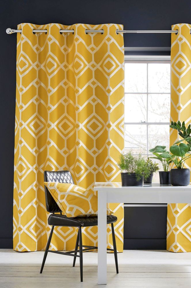 Yellow Geometric Patterned Curtains Frame a Window — GV Blinds in Benalla, VIC