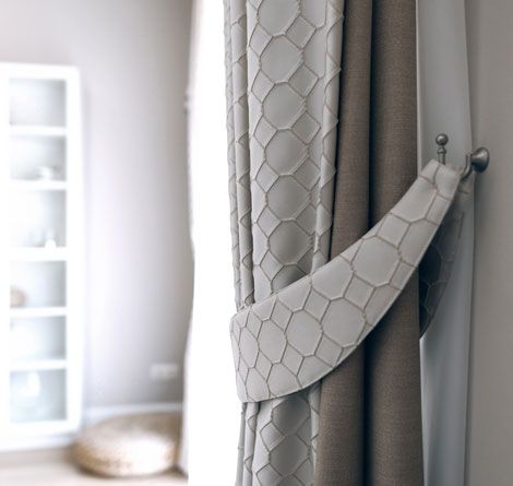 Grey and Brown Patterned Curtains Held Back by a Decorative Tieback — GV Blinds in Shepparton, VIC