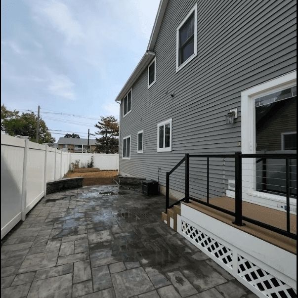 small composite deck and paver patio