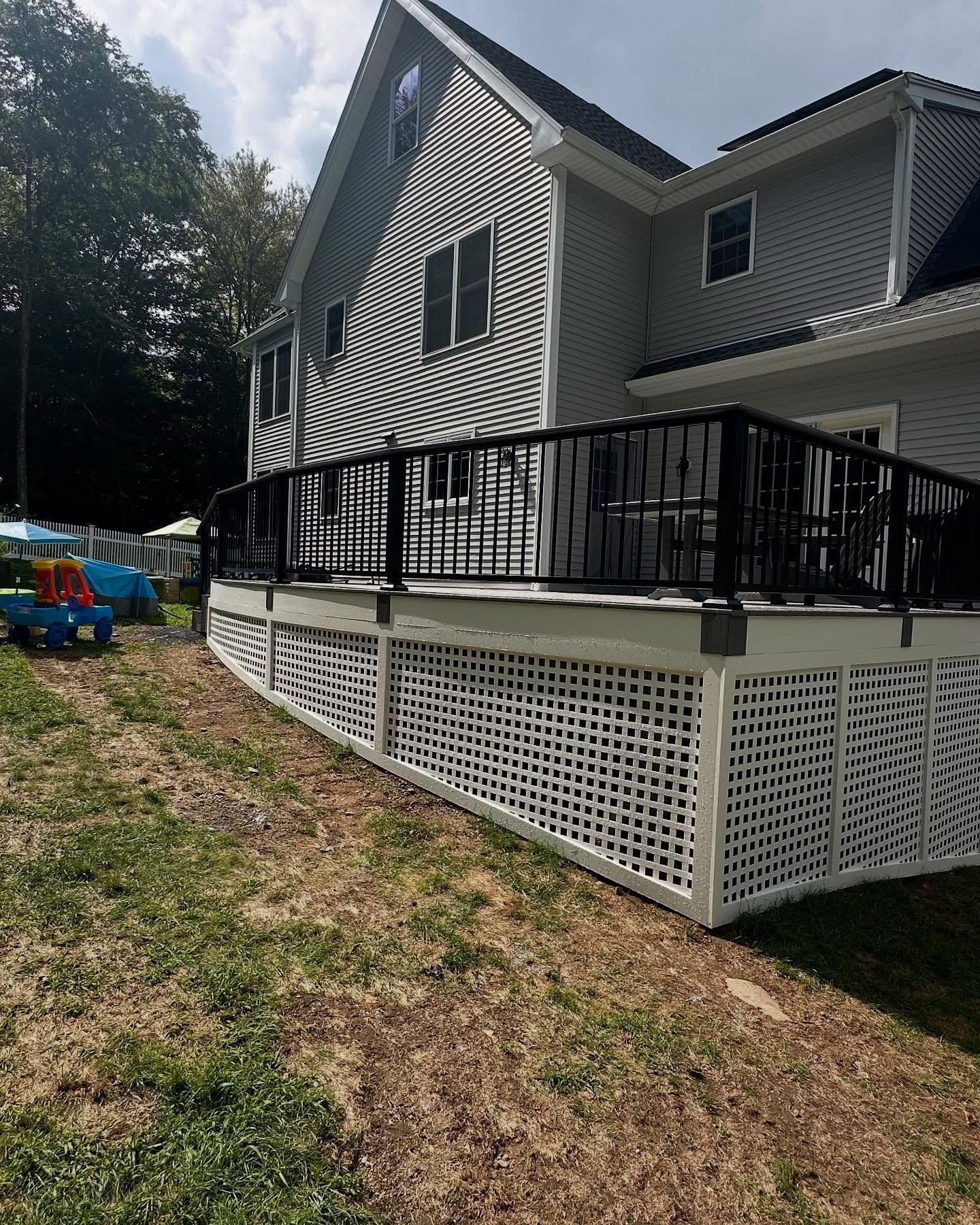 composite deck with metal railing and lattice