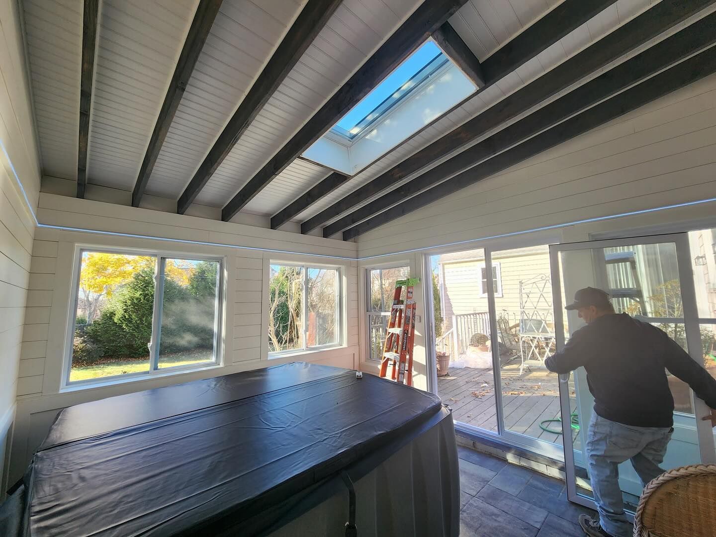 4 season room with hot tub