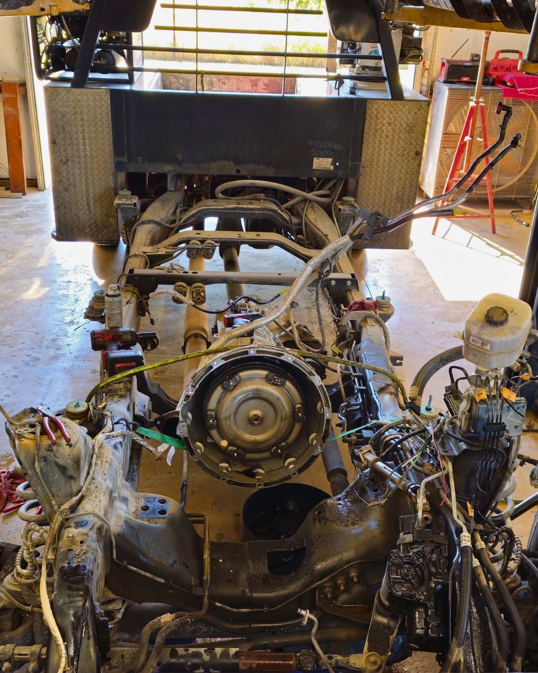 Vehicle Undercarriage Inspection On Hydraulic Lift | Brady’s Auto Repair