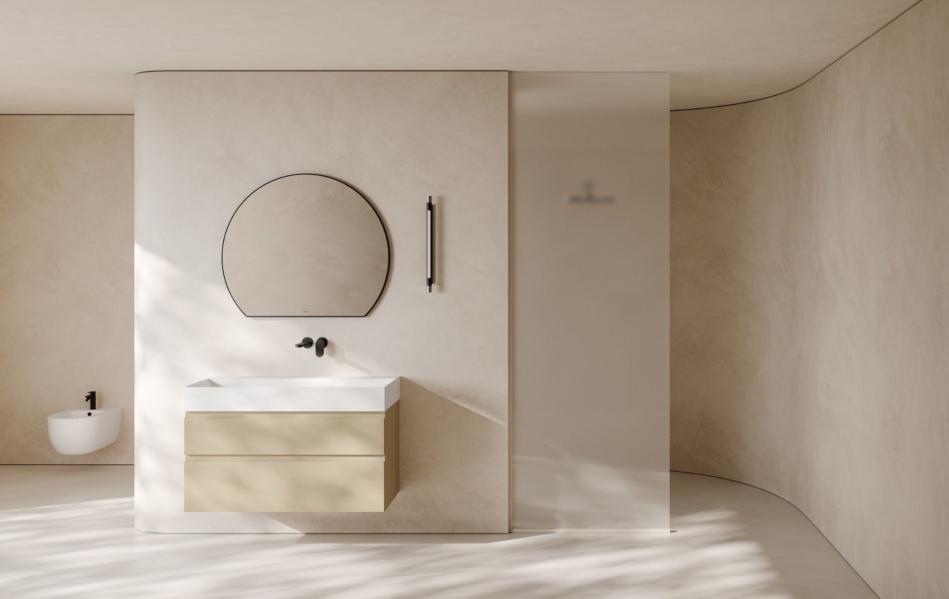 Bagno minimalista sui toni del beige con mobile lavabo sospeso, specchio rotondo e cabina doccia inondata di luce naturale.