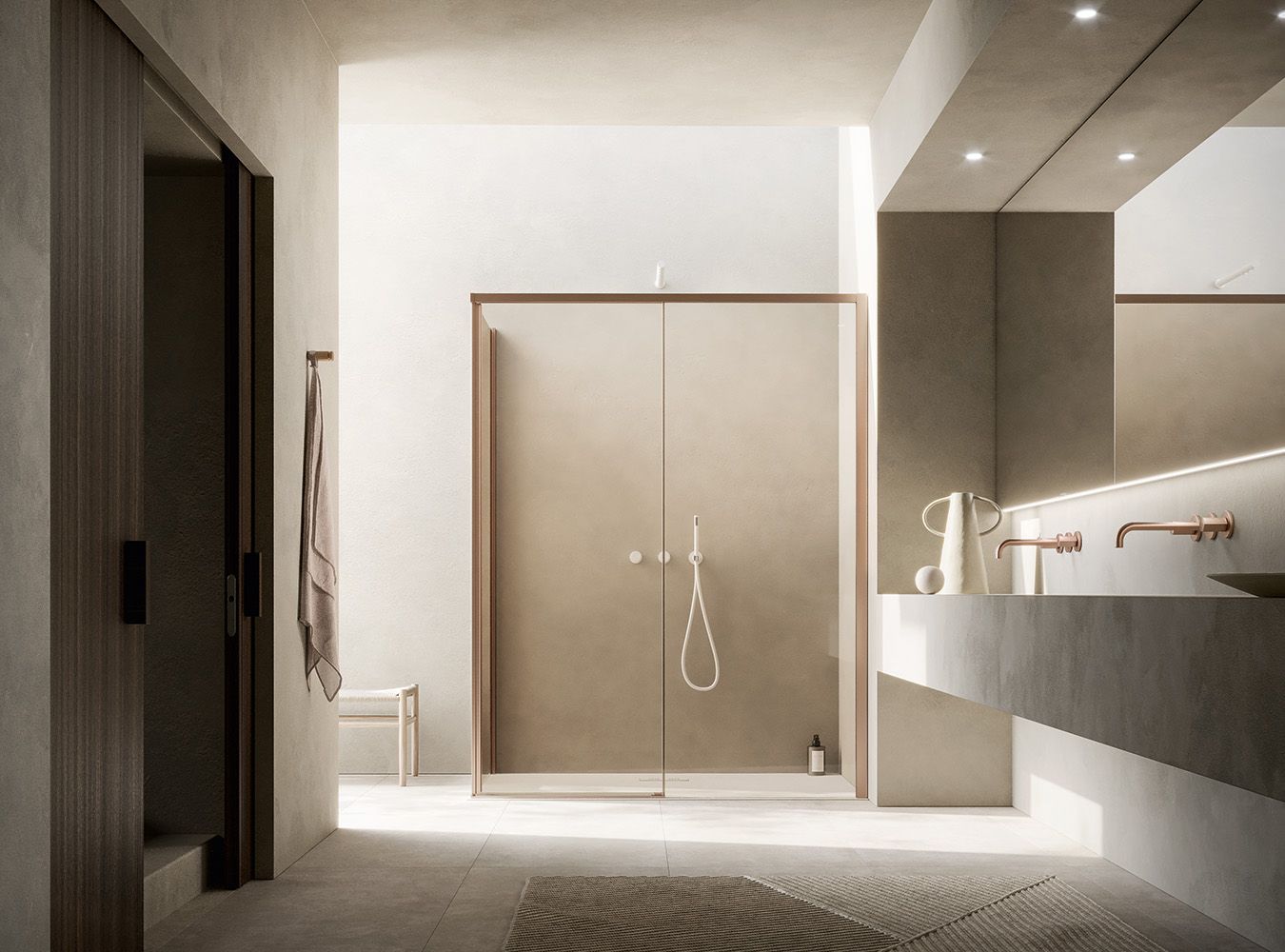 Bagno moderno e minimalista con box doccia in vetro, mobile bagno con doppio lavabo e calde tonalità neutre.
