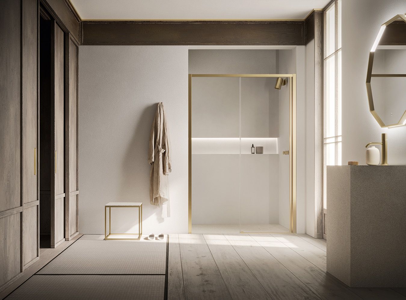 Interno del bagno minimalista con tonalità neutre, pavimento in legno e specchio con cornice dorata sopra il lavabo.