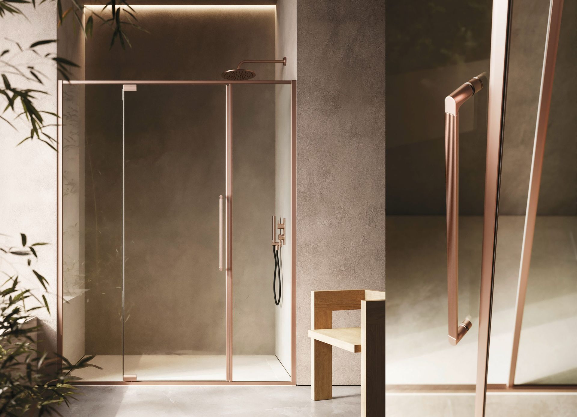 Box doccia angolare con ante in vetro trasparente e telaio argentato, installato in un angolo piastrellato del bagno.