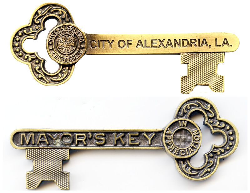 A key that says city of alexandria la on it