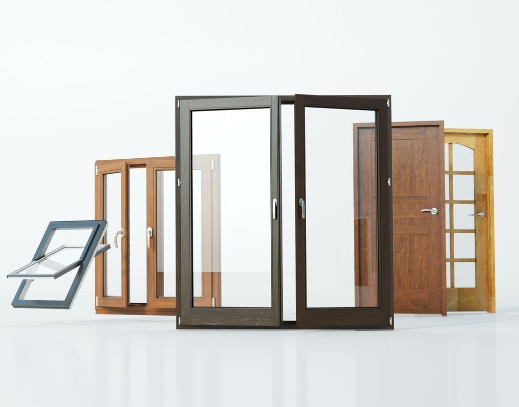 Un groupe de différents types de fenêtres et de portes sur une surface blanche.