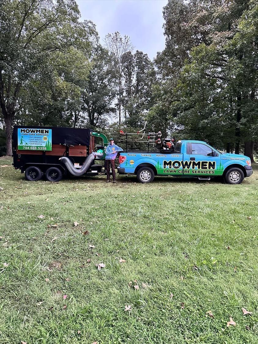 Mowmen lawn care services truck and trailer