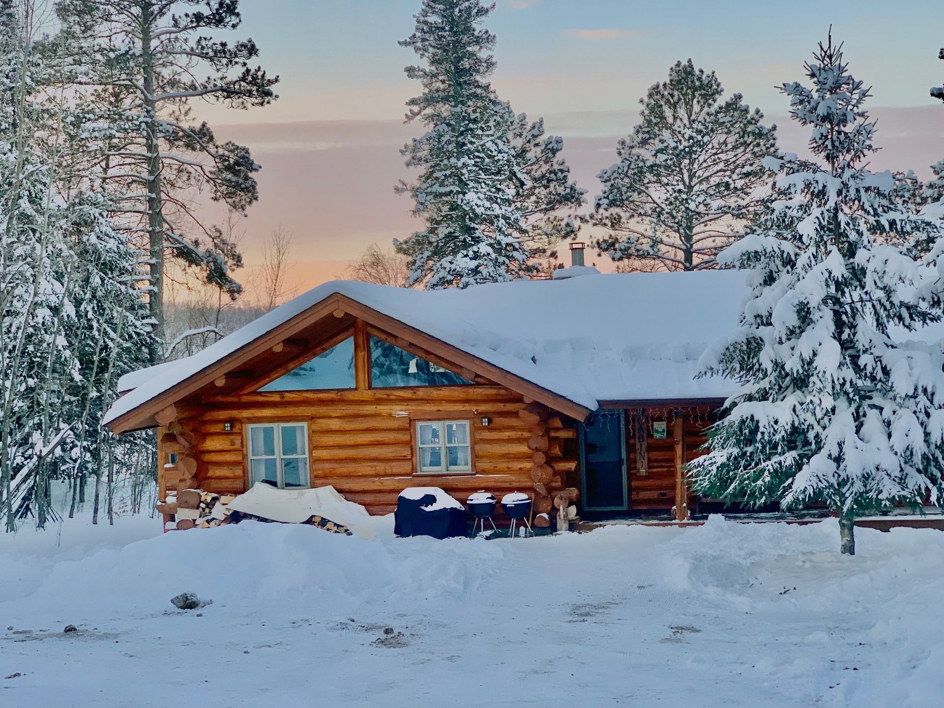 A red kayak with the word realized on the back