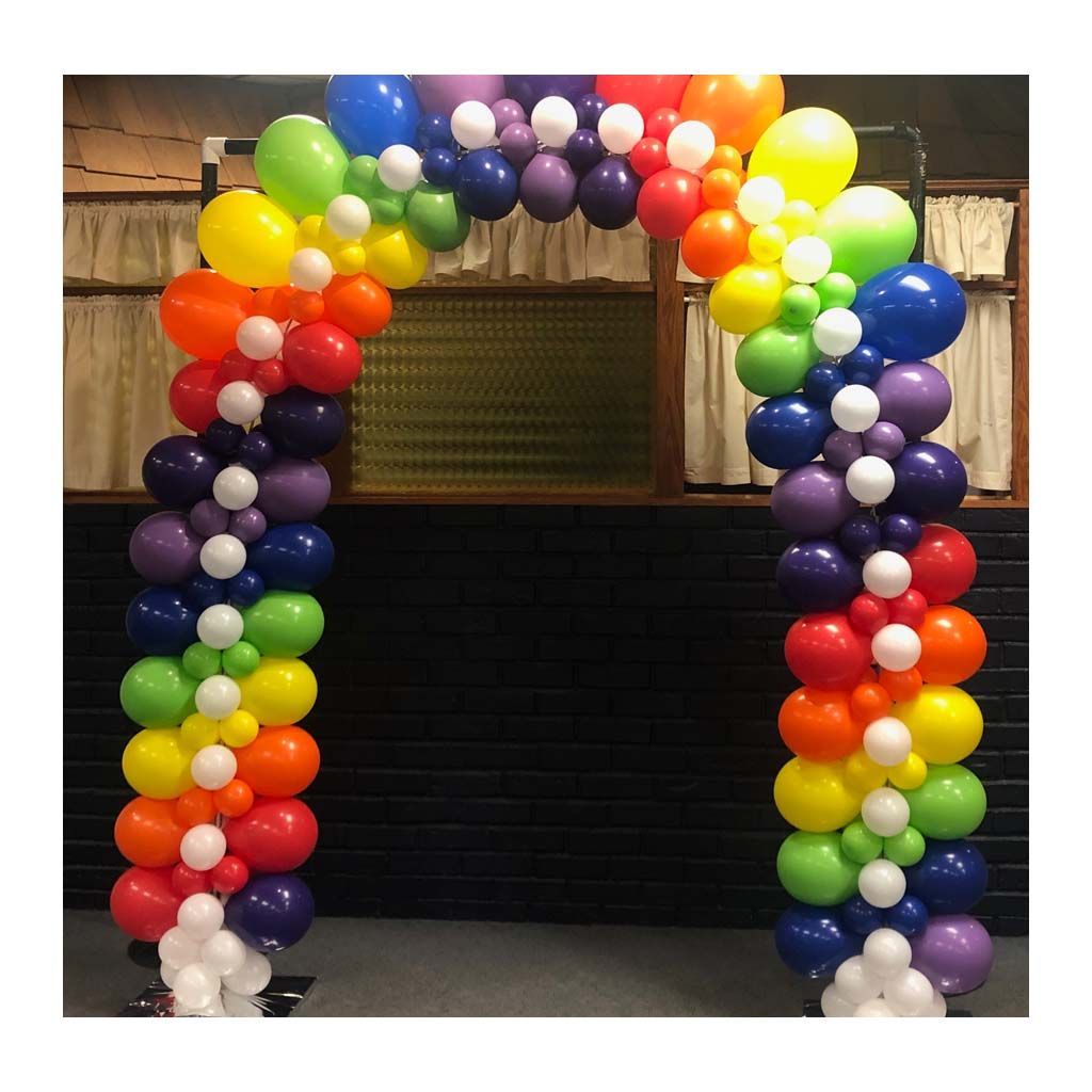 A bunch of colorful balloons are stacked on top of each other