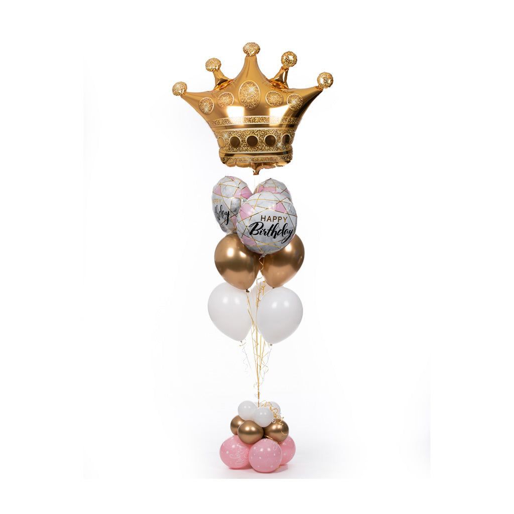 A bunch of balloons with a crown on top of them.