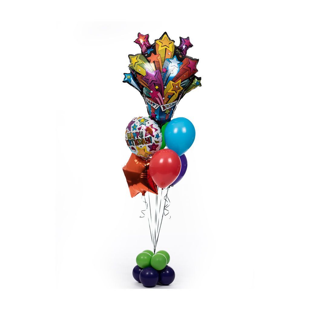 A bunch of balloons are sitting on top of each other on a white background.