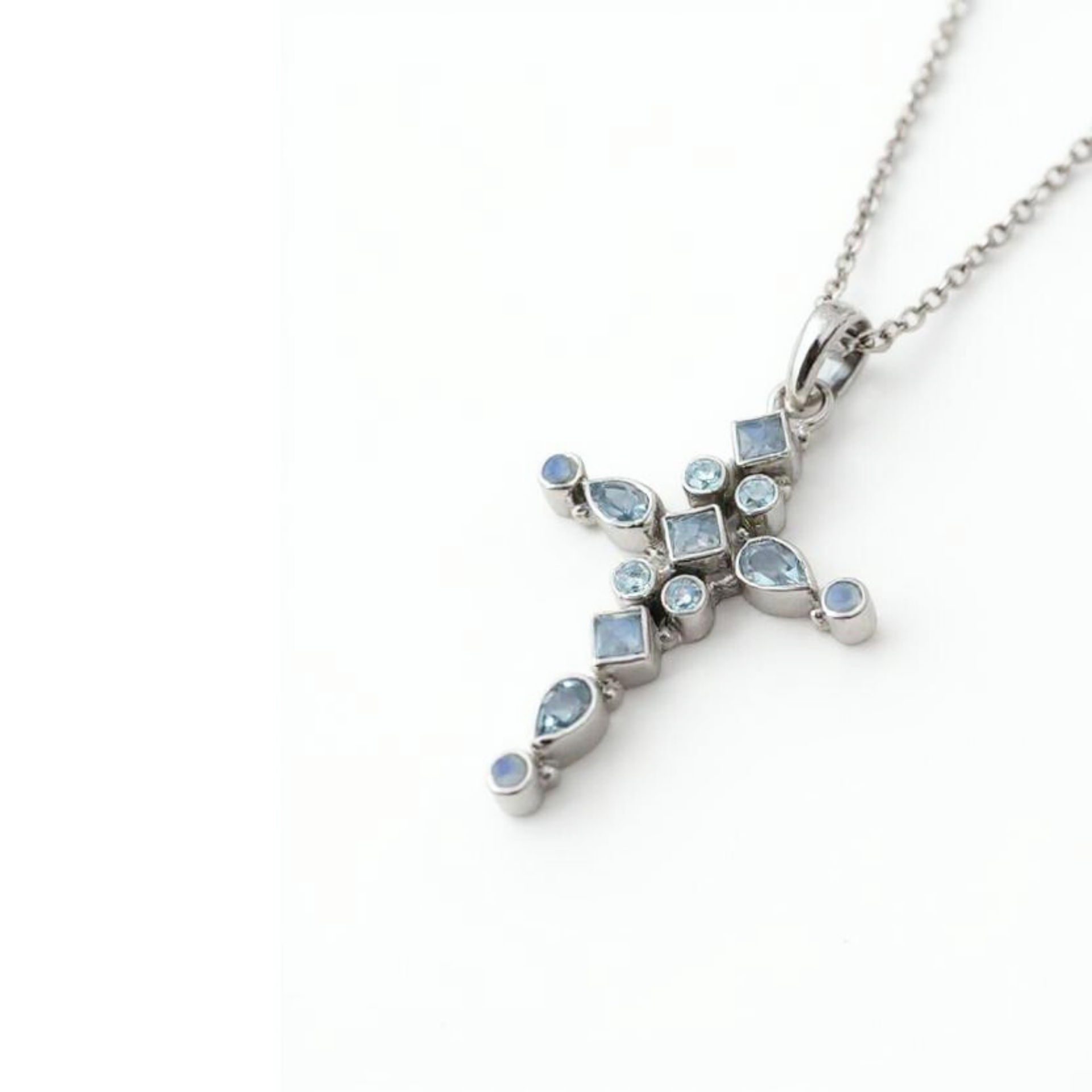 Cross Pendant with Blue Acquamarine and Blue Topaz Gemstones, sterling silver