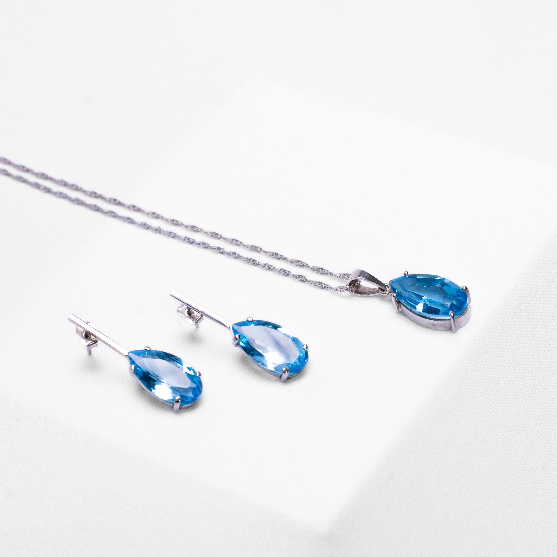 Blue Topaz Pendant and Blue Topaz Teardrop Earrings in Sterling silver