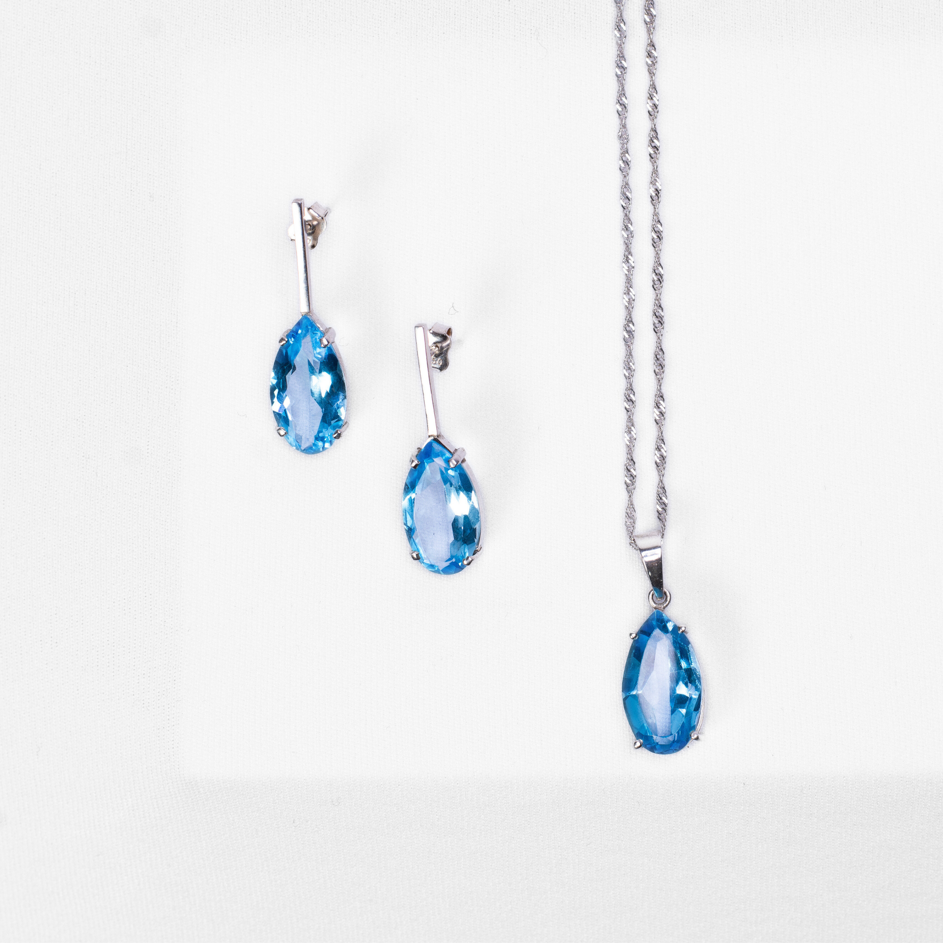 Blue Topaz Pendant and Blue Topaz Teardrop Earrings in Sterling silver