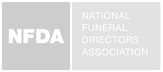 The logo for the national funeral directors association is gray and white.