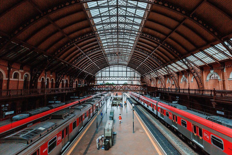 A photo of Estação Luz with the red train cars in São Paulo - Photo by John Michael Wilyat
