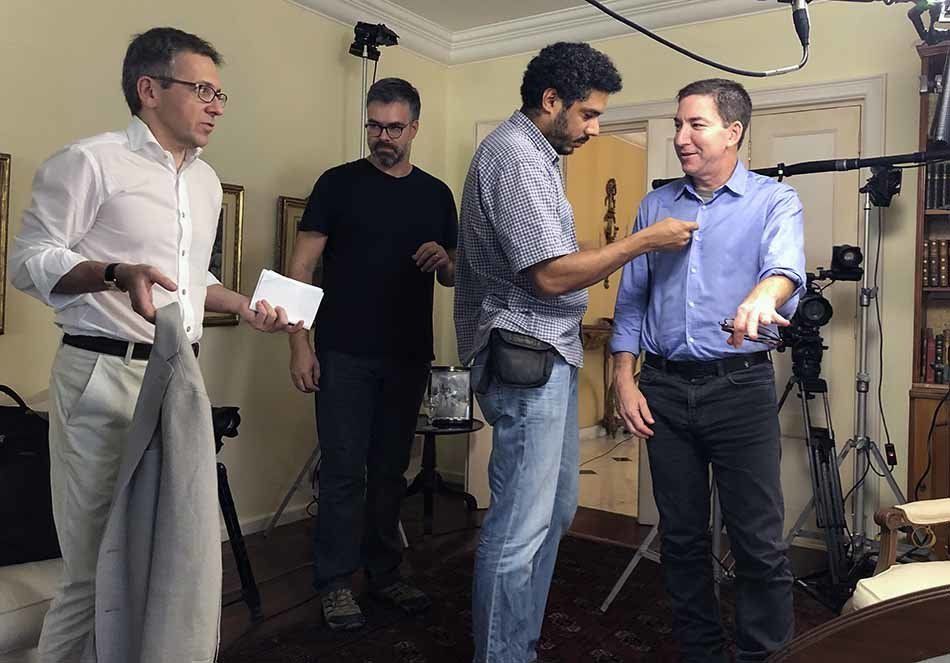 Ian Bremmer and Glenn Greenwald getting ready for the shoot