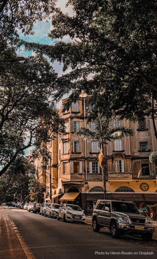 A street with parked cars in São Paulo - Photo by Heron Rossato on Unsplash