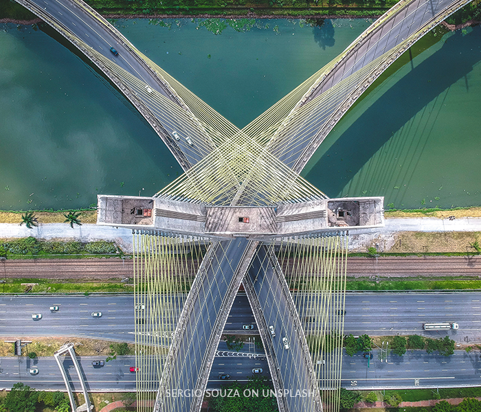 An aerial view of a bridge over a river