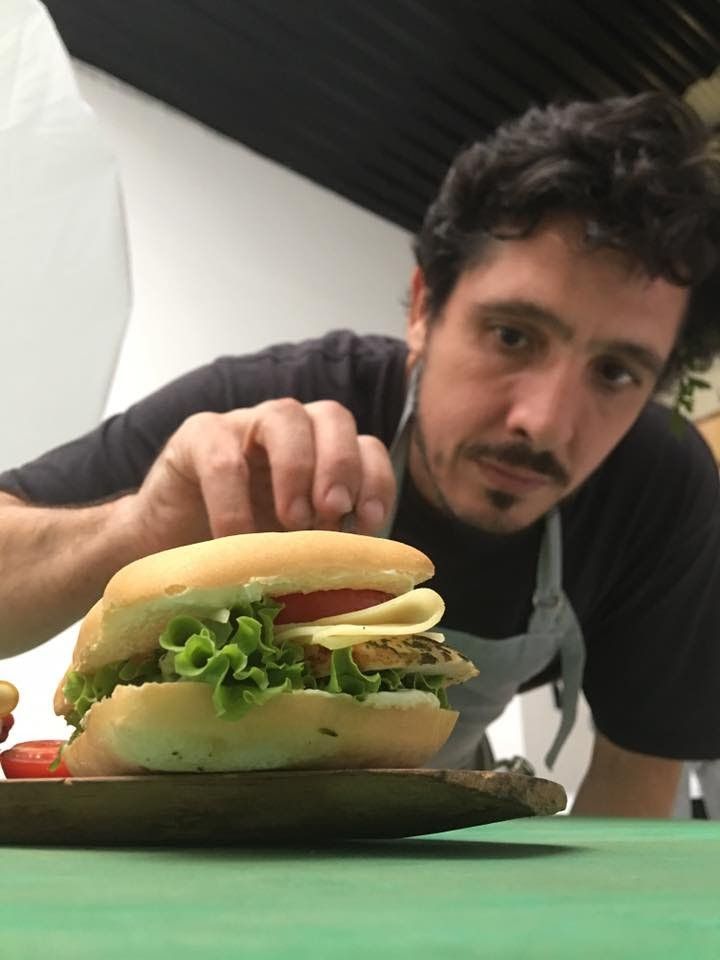 Food stylist preparing a sandwich