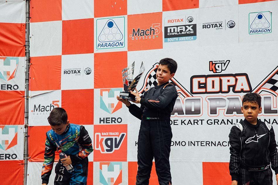 karting drivers on the podium