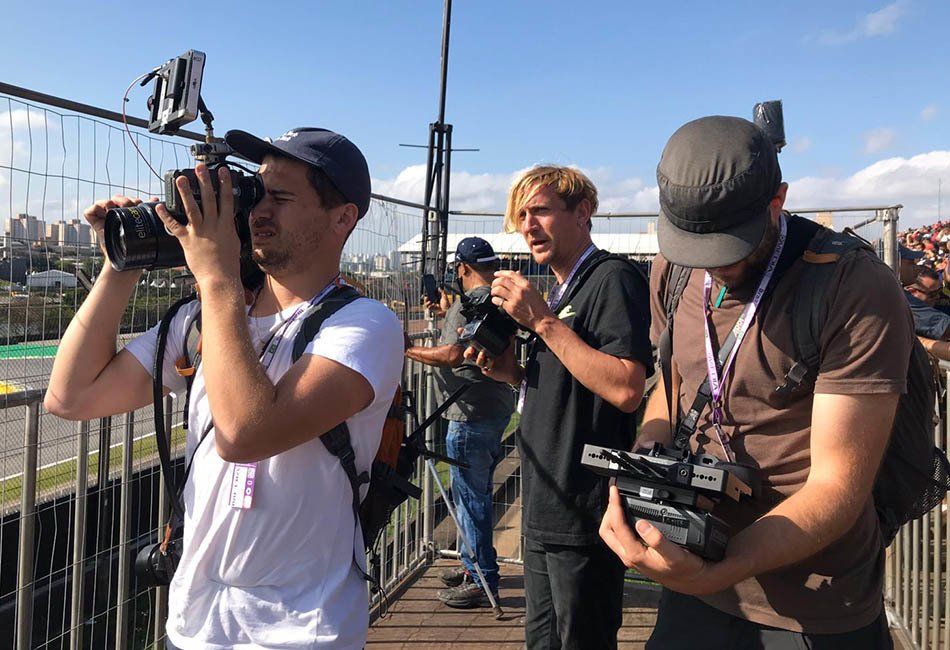 A crew filming at the Brazilian Grand Prix