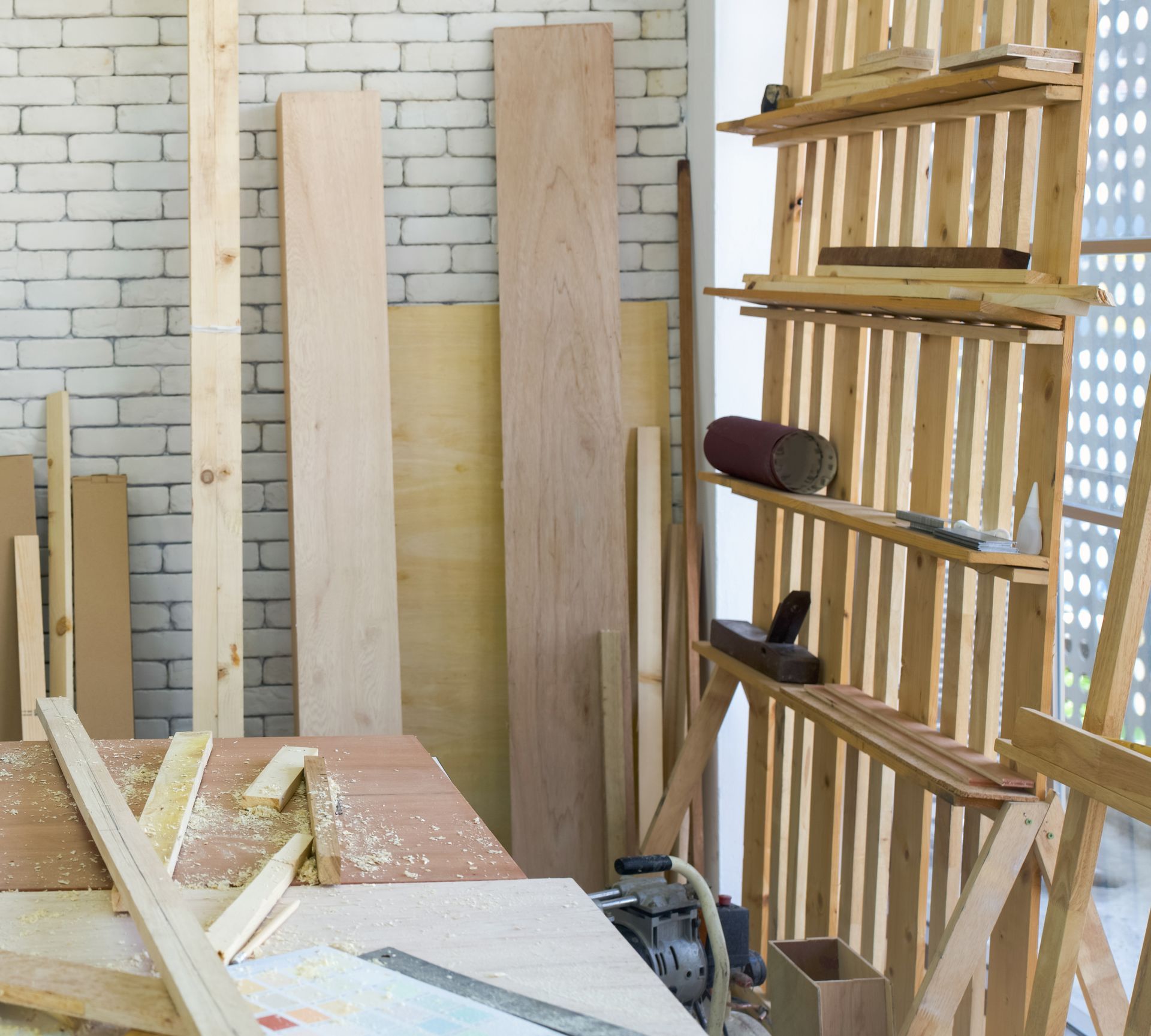 A desk full of wood piles