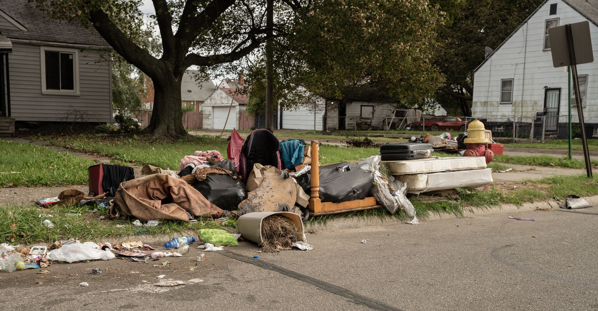 Home owners were evicted and their possessions are dumped on the street corner