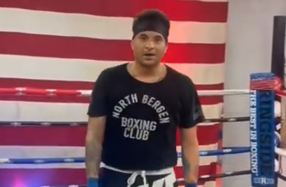 Photo of trainer Mike Carvajal in the State of Fitness boxing ring.