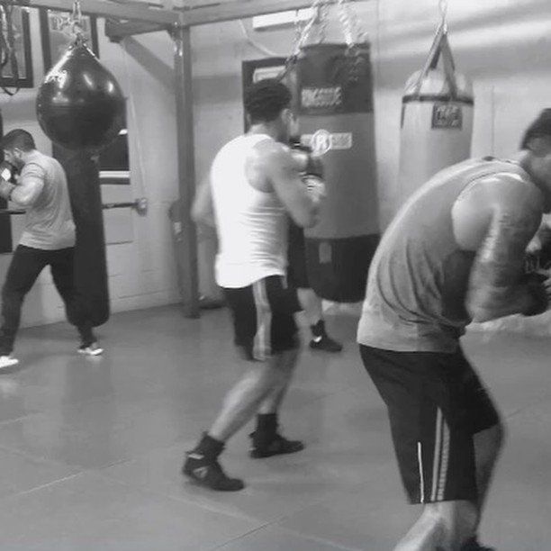 a picture of members training in the boxing club