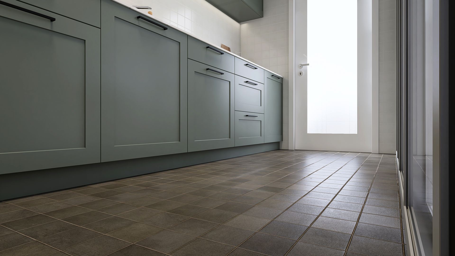 Modern kitchen with gray cabinets, tiled floor, and a bright window
