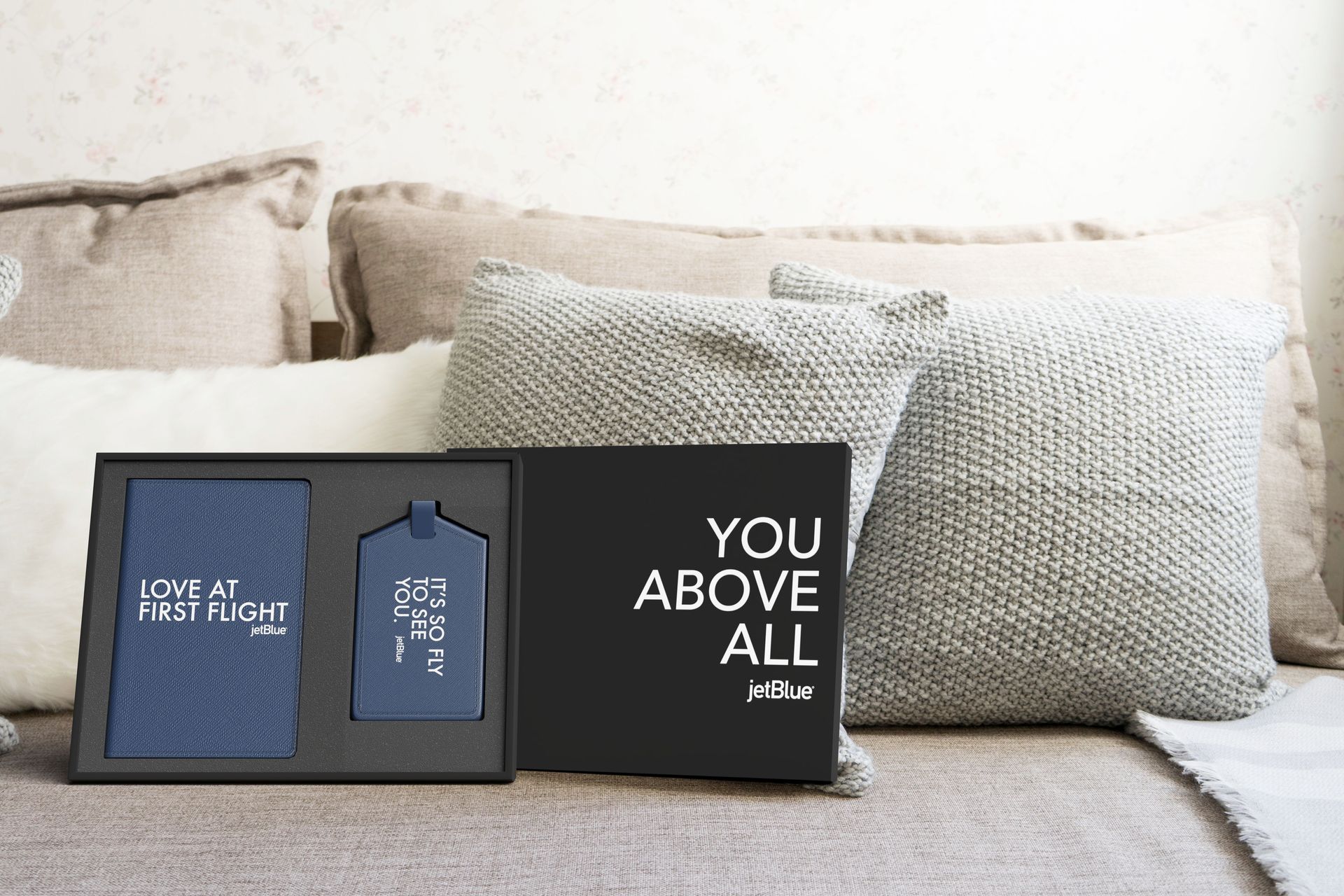 A bed with pillows and a sign that says you above all