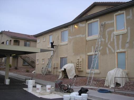 Building exterior being painted