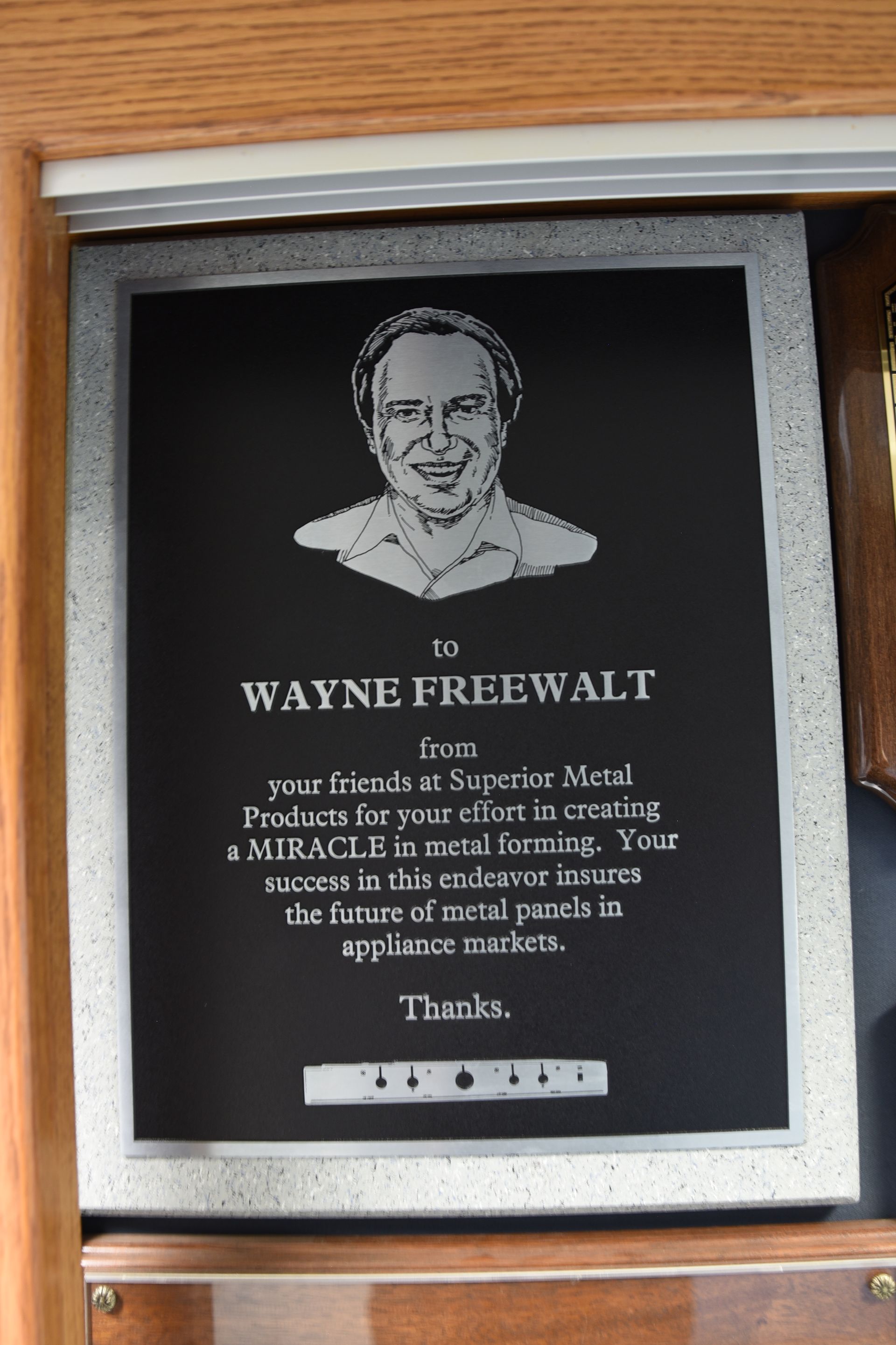 A picture of wayne freewalt in a frame