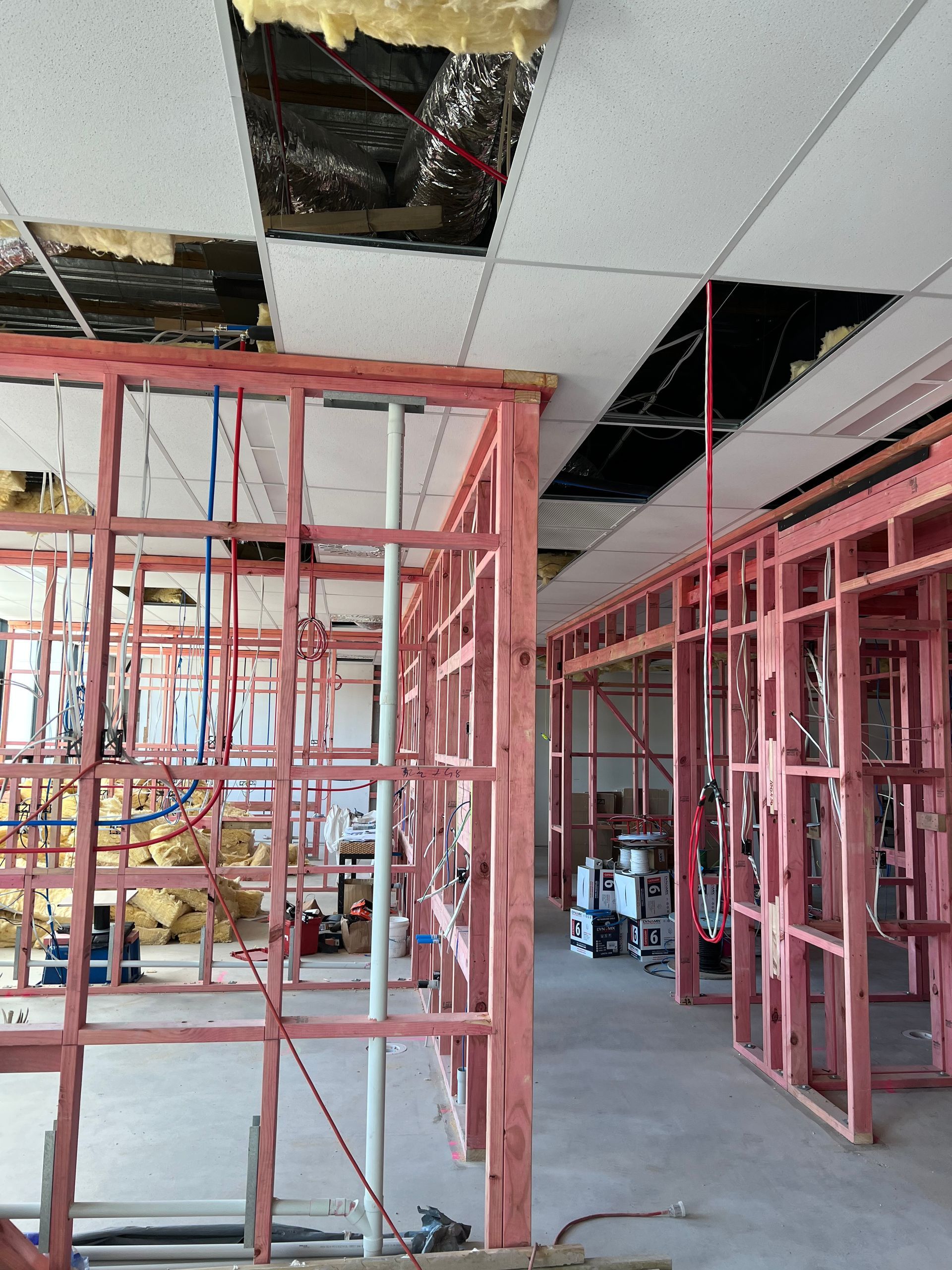 A building under construction with a hole in the ceiling