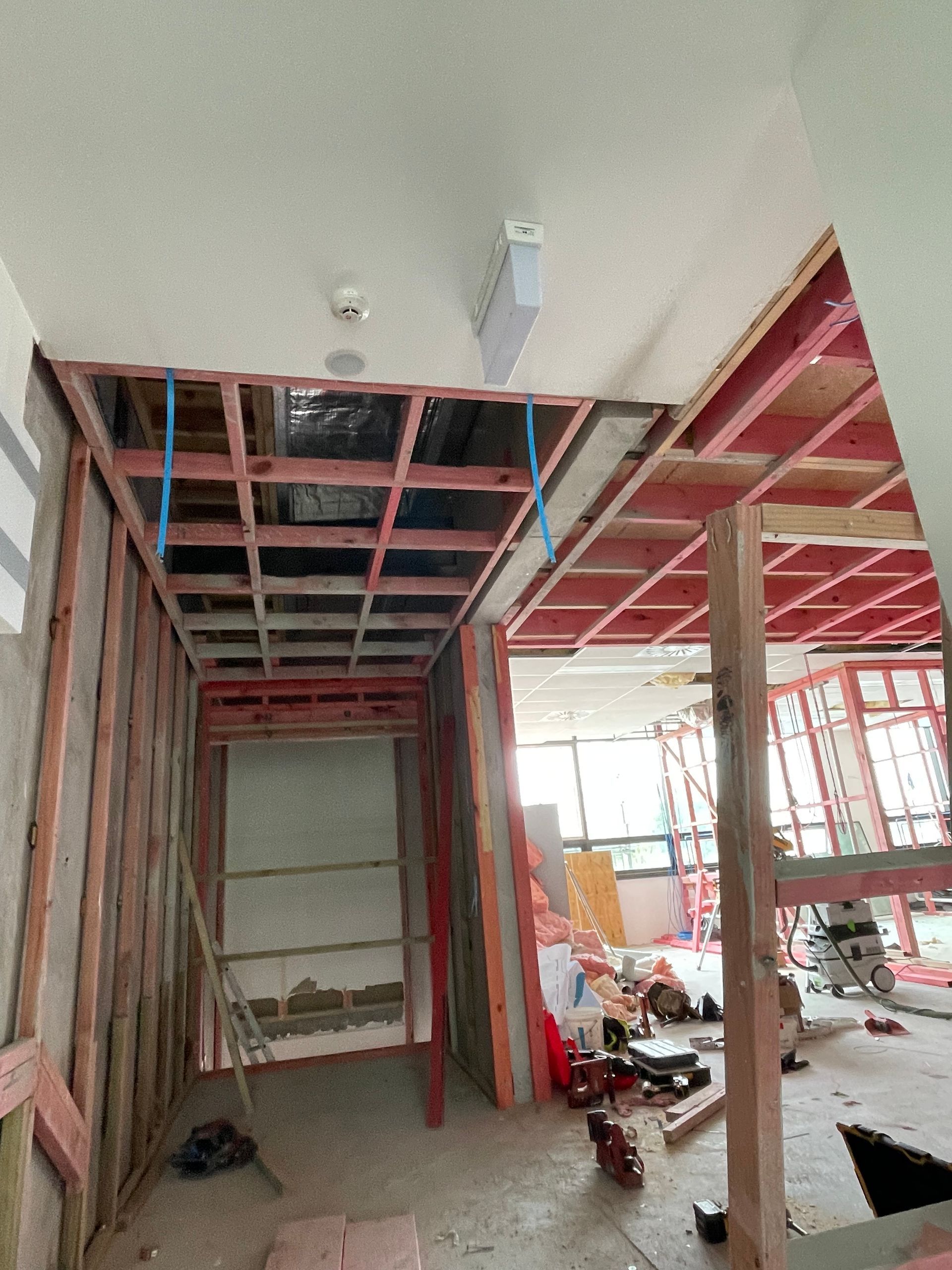 A room with a ceiling that is being built