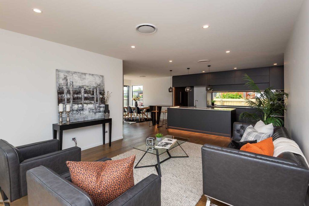 A living room filled with furniture and a coffee table.